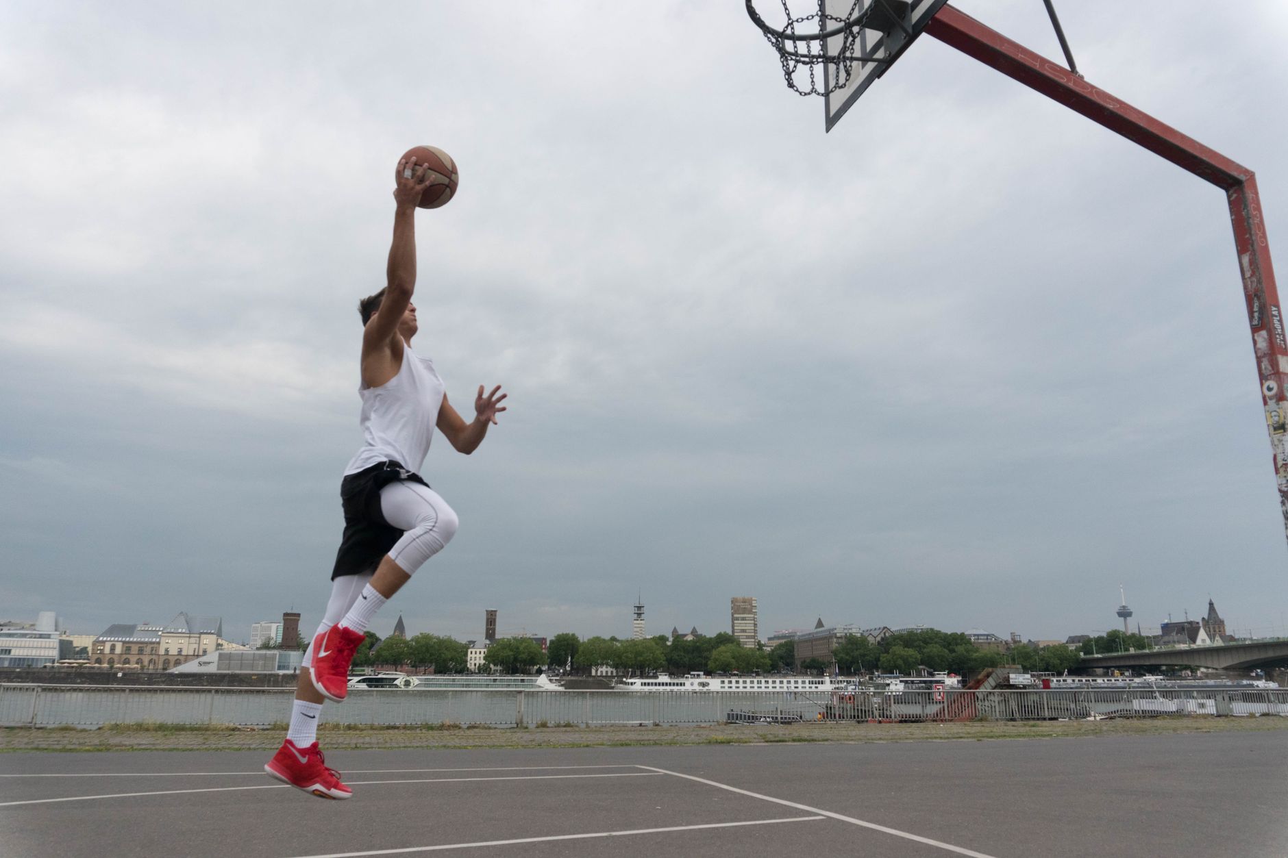 european basketball academy players training on court