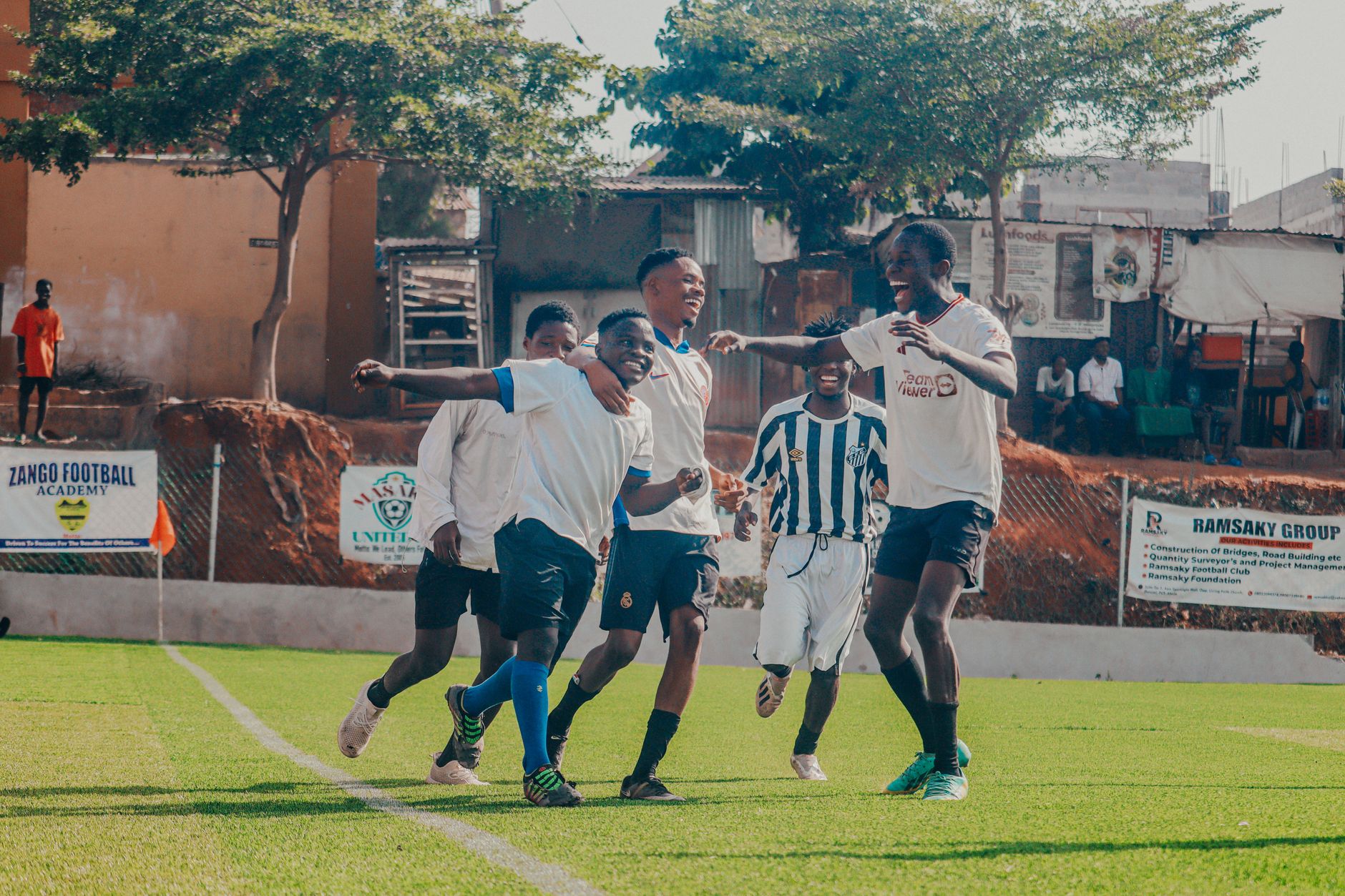 Youth football players training on a pitch